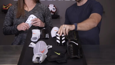 Two persons are choosing Shin Guard