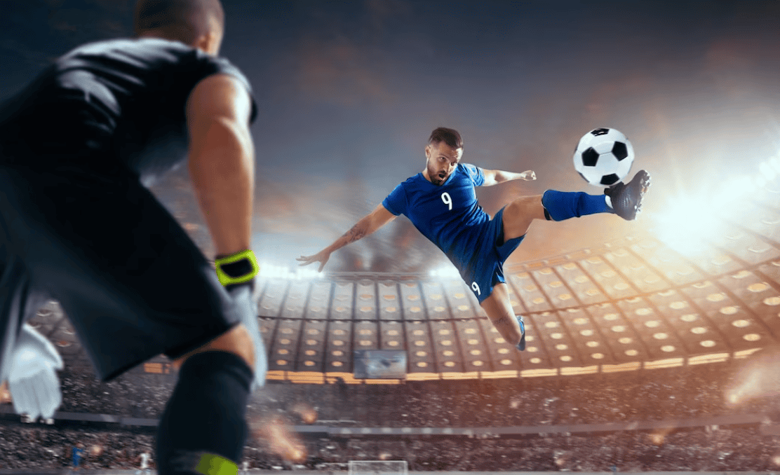 Soccer players in action on professional stadium, one is kicking the ball