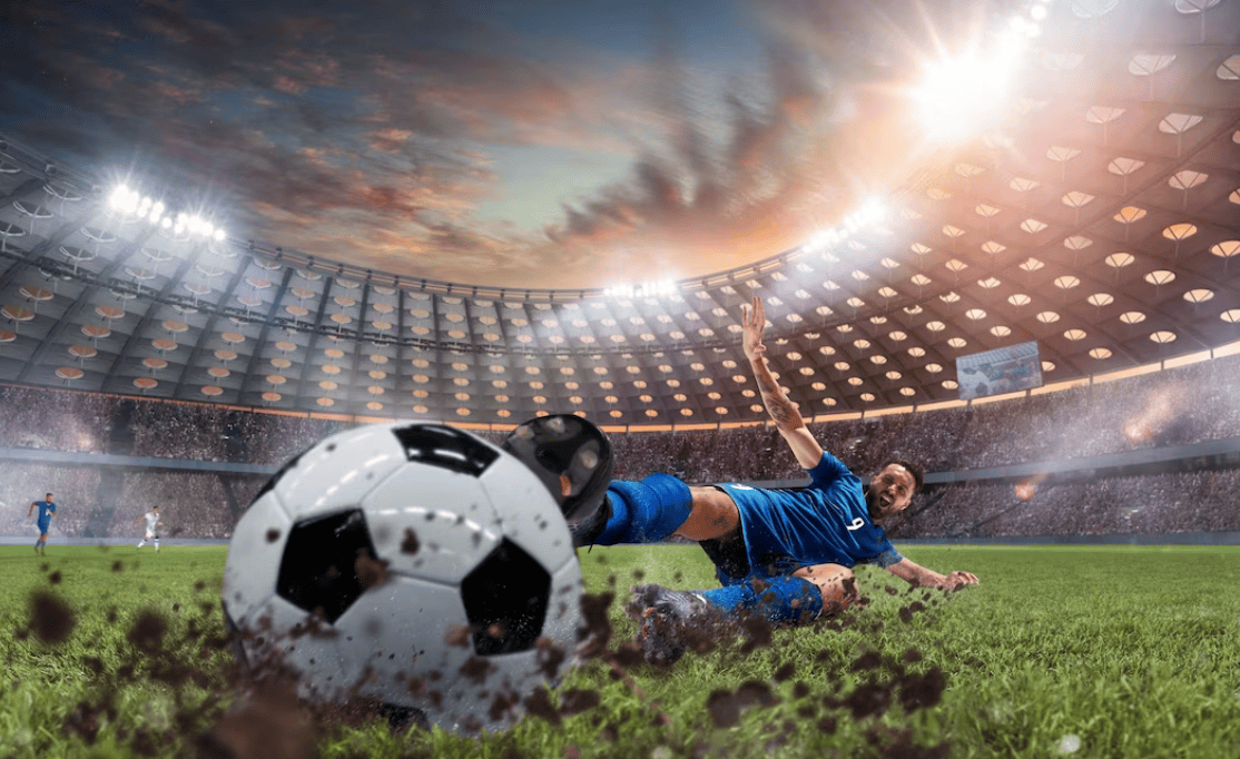 football player kicking the black and white ball, the stadium with audience behind