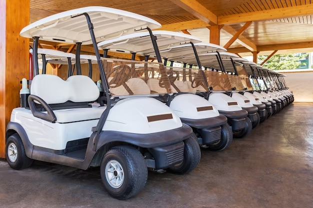 Golf cars in the parking lot. a lot in a row